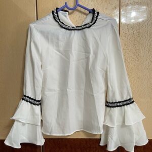 White chiffon blouse with ruffle sleeves